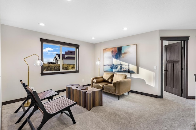 living room with light colored carpet