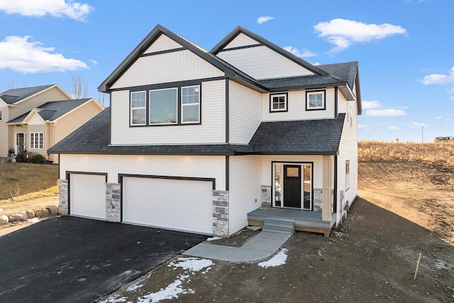 view of front of home with a garage