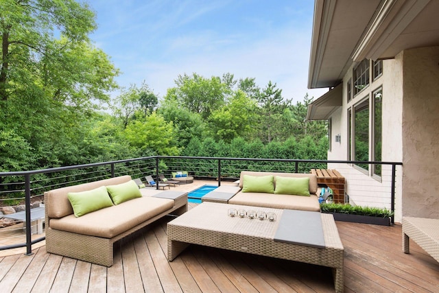 wooden deck with an outdoor hangout area