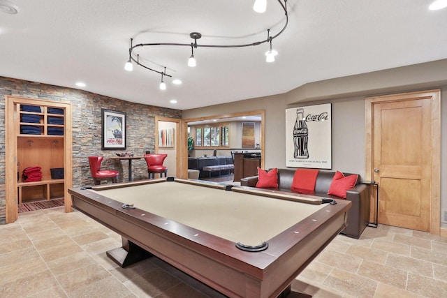 recreation room featuring billiards and a textured ceiling