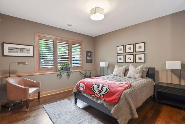 bedroom featuring dark hardwood / wood-style floors