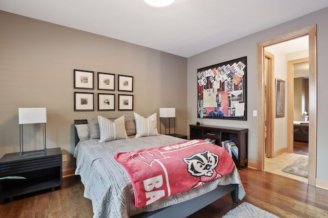 bedroom featuring hardwood / wood-style floors