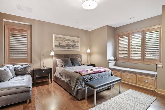 bedroom with wood-type flooring