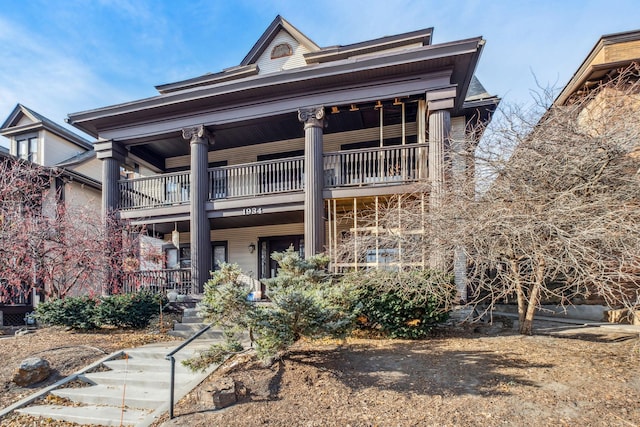 view of front of home with a balcony