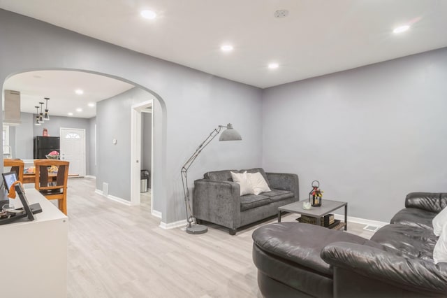 living room featuring light hardwood / wood-style floors