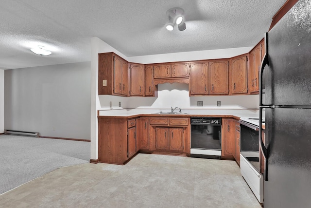 kitchen featuring a textured ceiling, black appliances, baseboard heating, light colored carpet, and sink