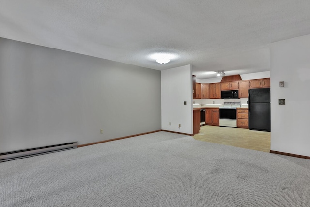 unfurnished living room with a baseboard heating unit, light carpet, and a textured ceiling