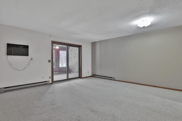 unfurnished room featuring a wall mounted AC, a baseboard radiator, and a textured ceiling