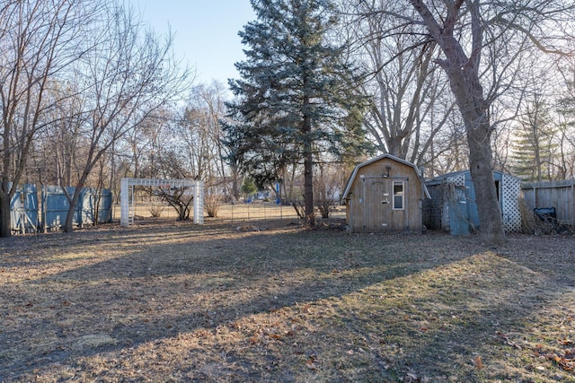 view of yard with a storage shed