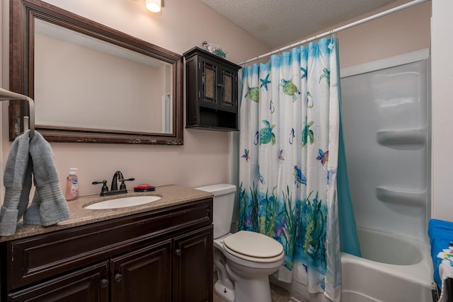 full bathroom with vanity, toilet, a textured ceiling, and shower / tub combo