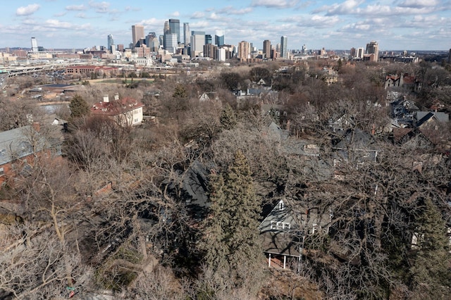 birds eye view of property with a view of city