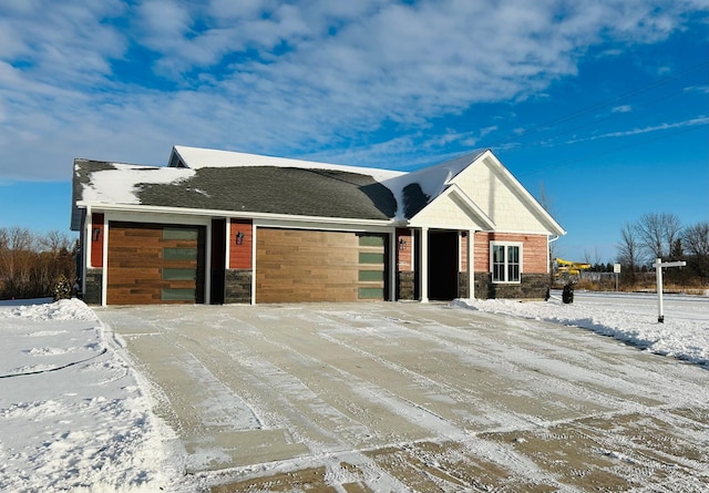 single story home featuring a garage