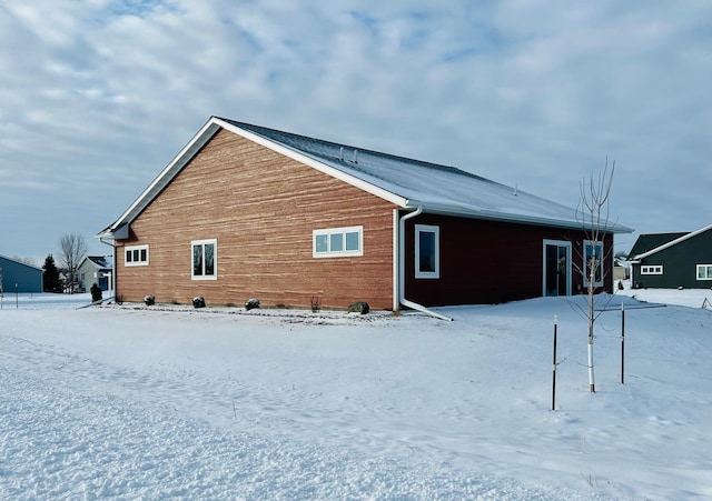 view of snow covered property