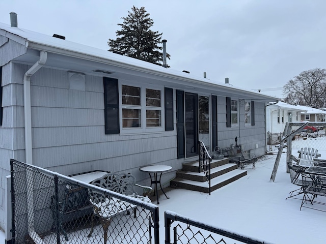 view of snow covered property