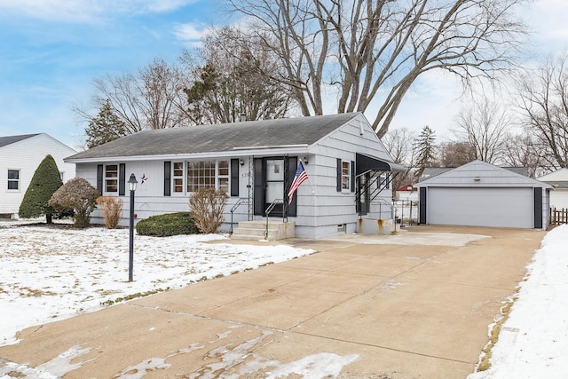 view of front of property with an outbuilding and a garage