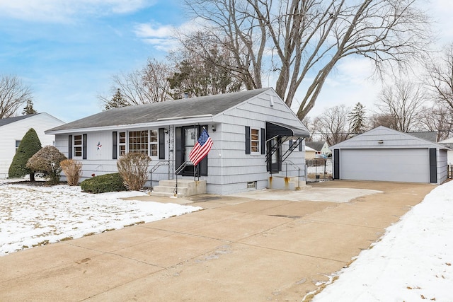 view of front of home with an outbuilding and a garage