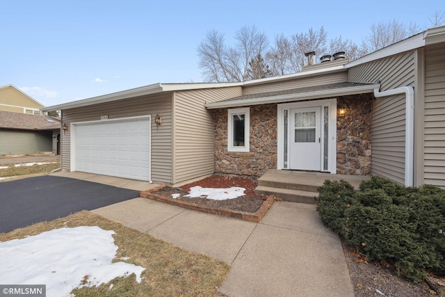 view of front of home with a garage