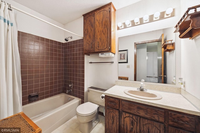 full bathroom featuring vanity, toilet, and shower / bath combo with shower curtain