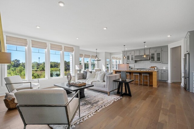 living room with dark hardwood / wood-style floors