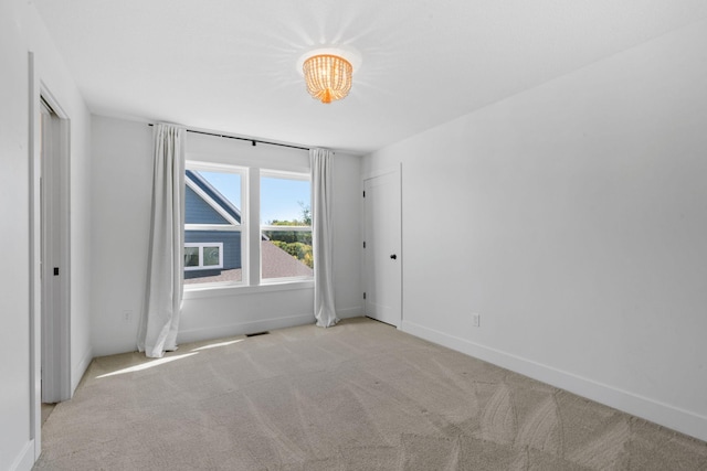 view of carpeted spare room