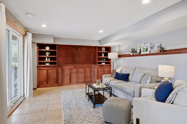 living room with recessed lighting and light tile patterned flooring