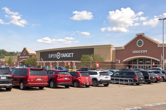 view of property featuring uncovered parking