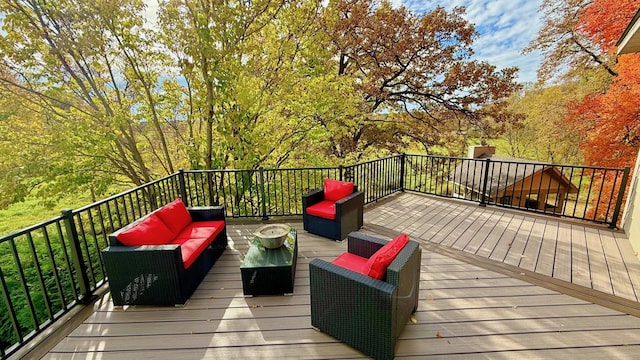 wooden terrace featuring an outdoor living space