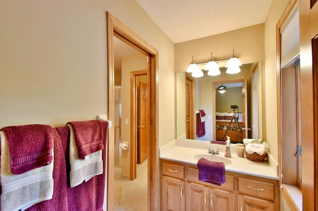 bathroom with vanity and ceiling fan