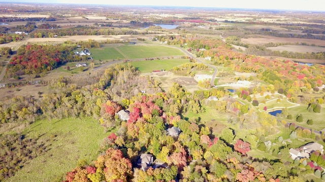 drone / aerial view with a rural view and a water view