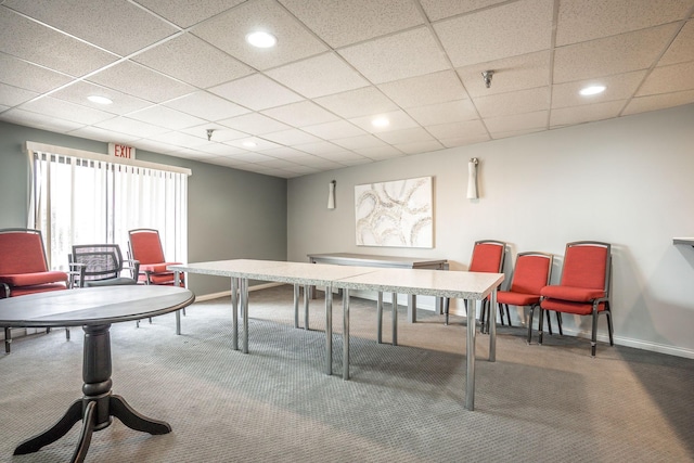 rec room featuring a paneled ceiling and carpet floors