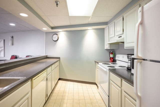 kitchen featuring sink, white appliances, a drop ceiling, and custom exhaust hood