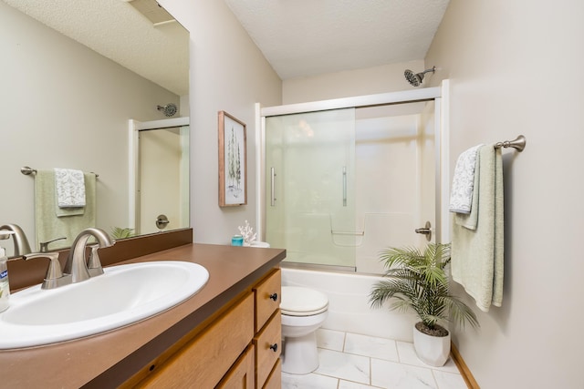 full bathroom featuring vanity, toilet, enclosed tub / shower combo, and a textured ceiling