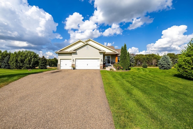 craftsman house featuring a garage and a front lawn