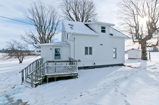 view of snow covered property