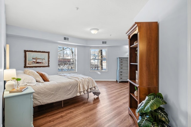 bedroom featuring hardwood / wood-style flooring