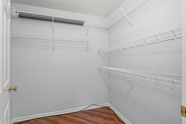 1350 Douglas Dr N Unit 105, Golden Valley, MN 55422 - spacious closet featuring wood finished floors