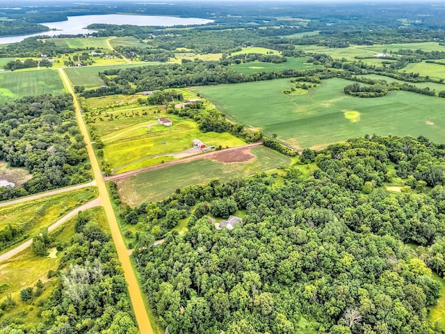 drone / aerial view with a rural view and a water view