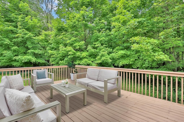 wooden terrace with outdoor lounge area