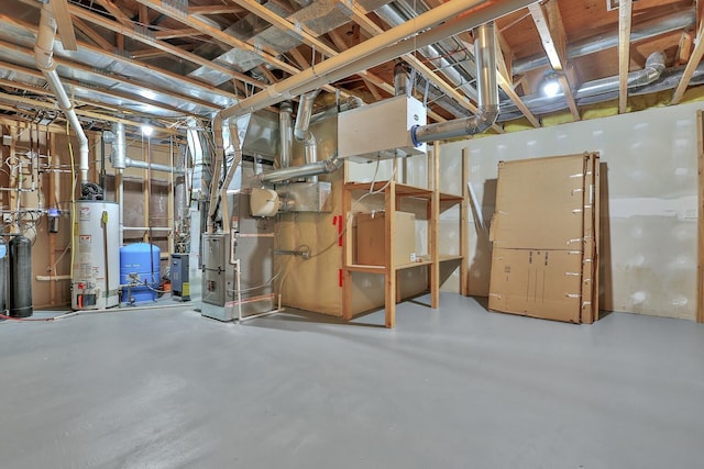 basement with gas water heater and heating unit