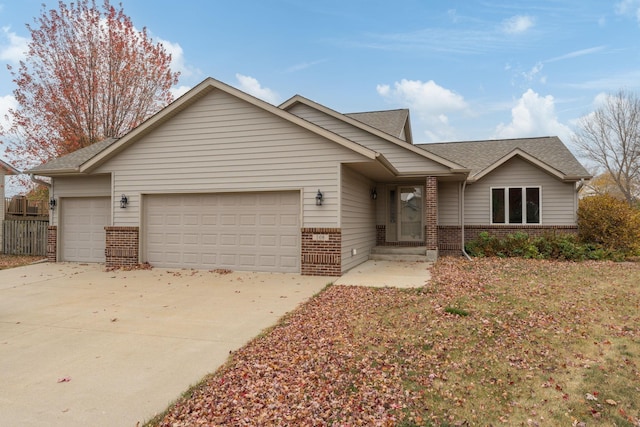 ranch-style home featuring a garage