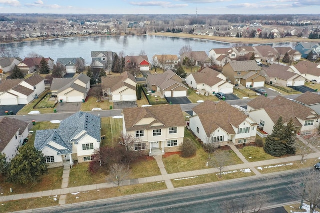 bird's eye view with a water view