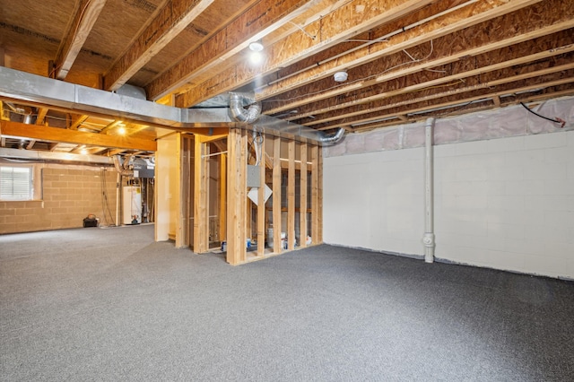 basement featuring water heater