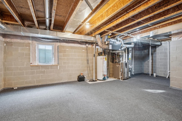 basement featuring carpet, heating unit, and water heater