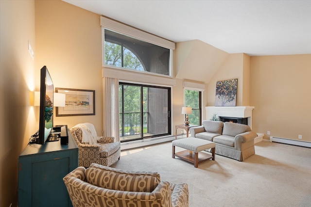 living room with light carpet, a high ceiling, and a baseboard radiator