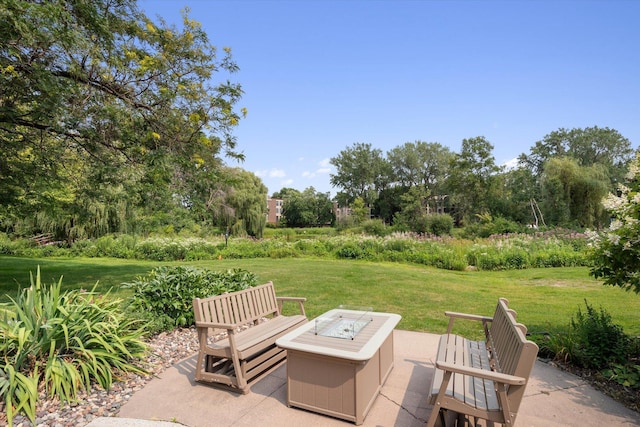 view of patio / terrace featuring a fire pit