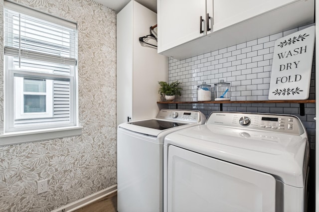 14592 Twin Lakes Cir, Burnsville, MN 55306 - laundry area featuring cabinet space, wallpapered walls, independent washer and dryer, and baseboards