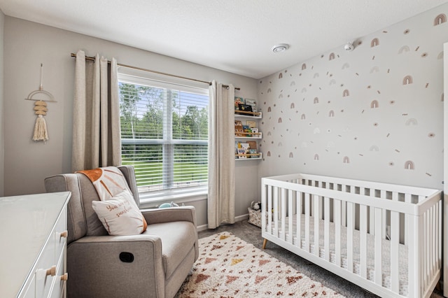 14592 Twin Lakes Cir, Burnsville, MN 55306 - carpeted bedroom with a crib and baseboards