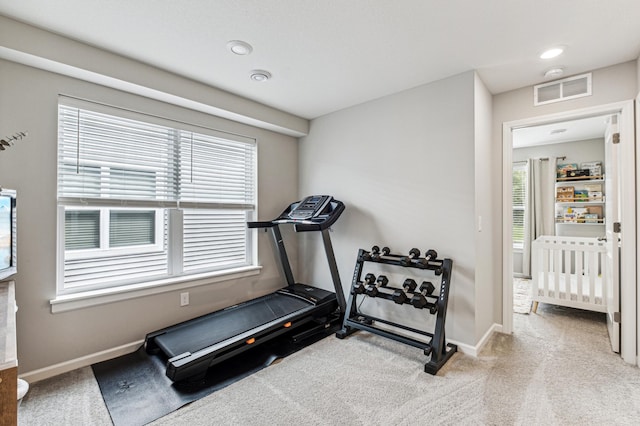 14592 Twin Lakes Cir, Burnsville, MN 55306 - exercise room featuring visible vents, baseboards, and carpet