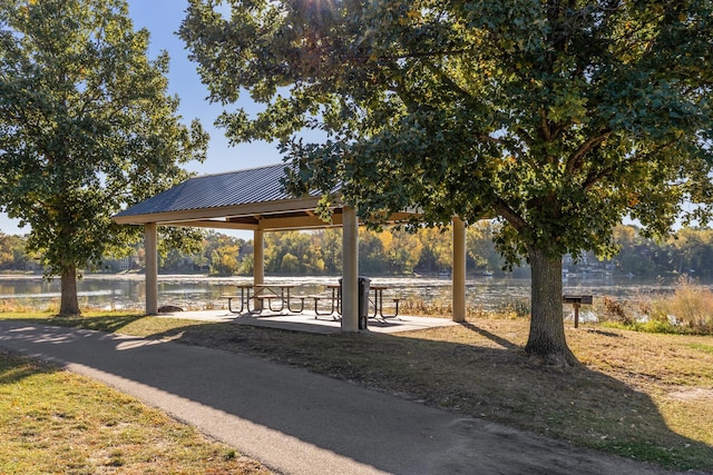 view of property's community featuring a gazebo and a water view