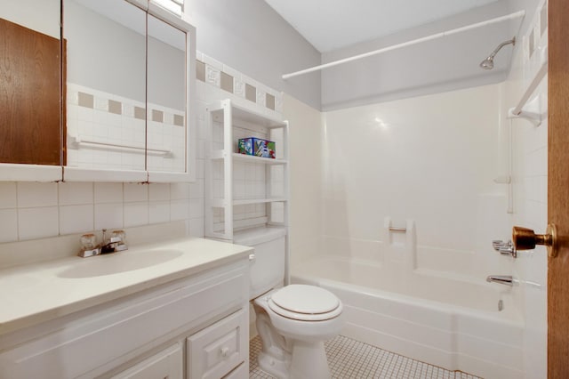 full bathroom featuring toilet, bathtub / shower combination, backsplash, tile patterned floors, and vanity